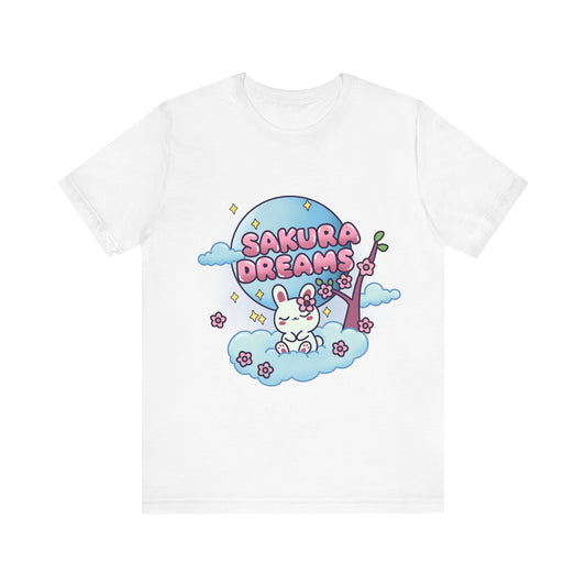 Sakura Dreams Kawaii Bunny T-Shirt featuring a cute white bunny with a sakura tree, sitting on a cloud under a full moon with cherry blossoms and stars