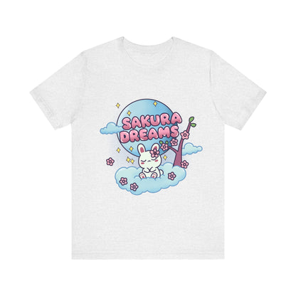 Sakura Dreams Kawaii Bunny T-Shirt featuring a cute white bunny with a sakura tree, sitting on a cloud under a full moon with cherry blossoms and stars